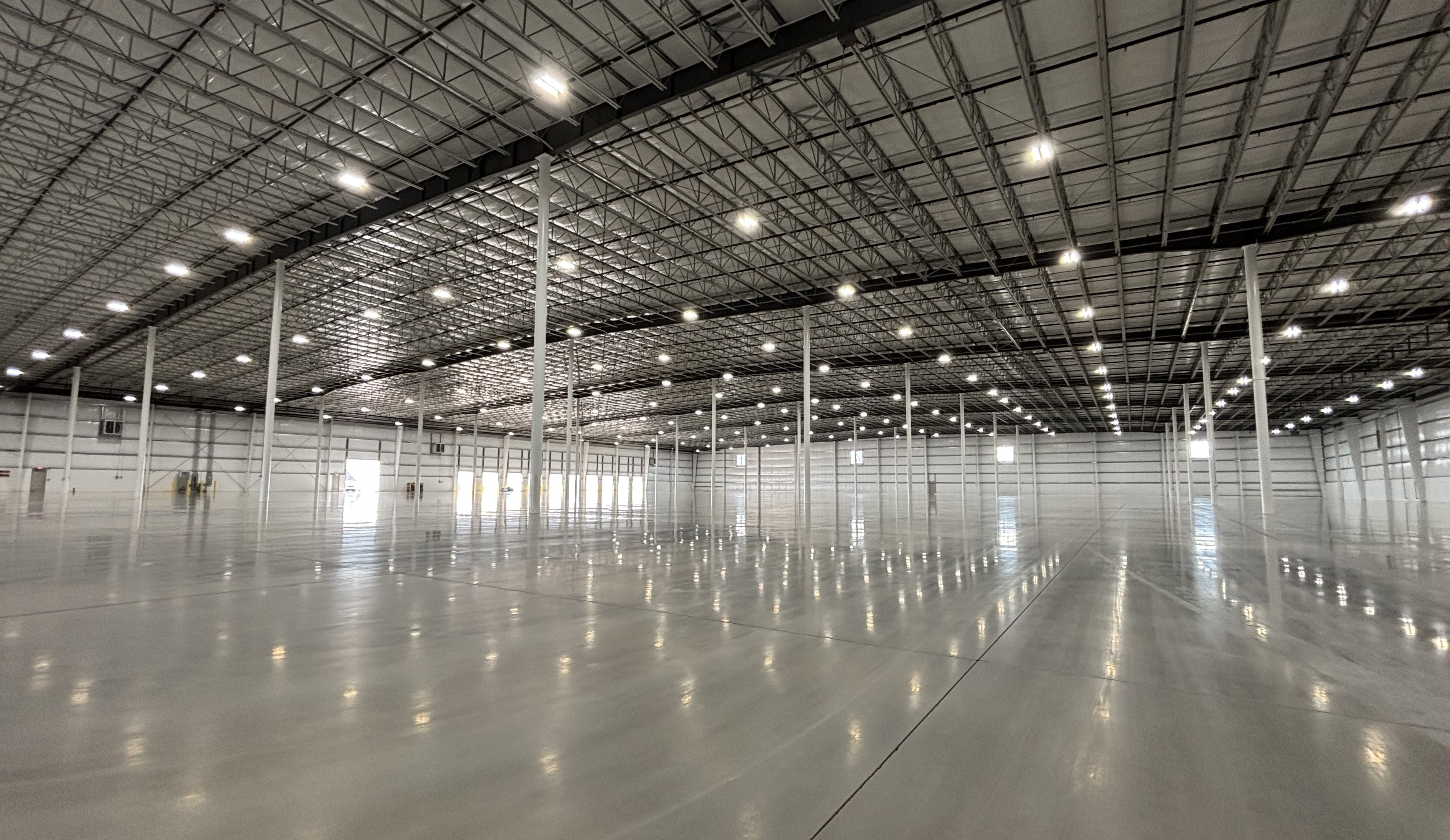 Modern Industrial Building Interior with High Ceilings and Polished Floors